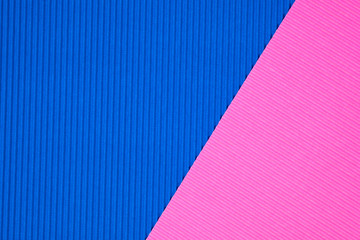 Blue and pink corrugated paper texture, use for background. vivid colour with empty space for add text or object.