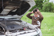 © pengzphoto - man with broken car