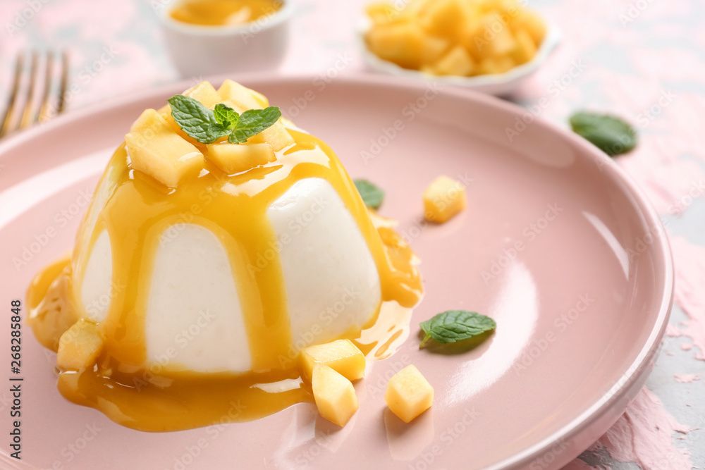 Tasty panna cotta on plate, closeup