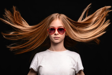 Wall Mural - Stylish teenage girl on dark background