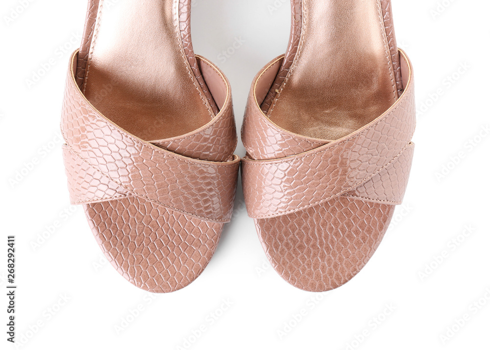 Pair of stylish female shoes on white background