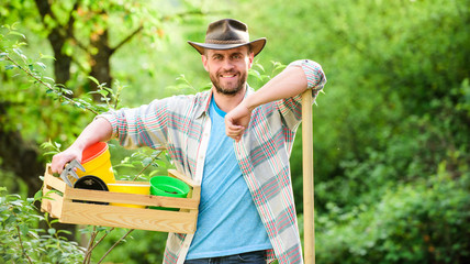 Sticker - farming and agriculture cultivation. Garden equipment. muscular ranch man in cowboy hat. Eco farm. Harvest. sexy farmer hold shovel and box with pot. happy earth day. Eco living. The best job ever