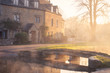Lower Slaughter in the Cotswolds on the River Windrush in the mist