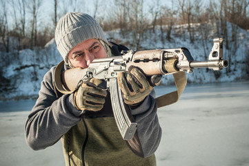 Wall Mural - Instructor demonstrate body position of rifle shooting on shooting range