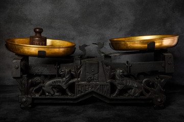 Wall Mural - antiquarian scales with two golden bowls and small weight