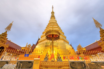 Phrae, Thailand - December 29, 2018: Golden pagoda for year of tiger at  Wat Prathat Cho Hae Temple in province.