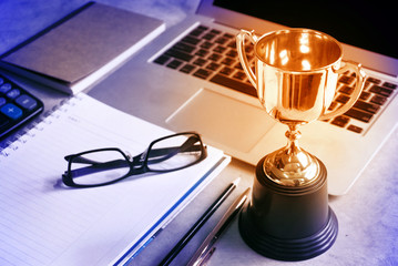Wall Mural - trophy decorate on working table,acheive concept.