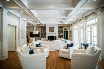 Wall Mural - Large Living Room Den in Home with Vaulted Tray Ceiling and bookshelves