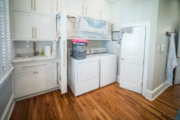 Spacious Laundry Room in a Large Home with Vaulted Ceilings