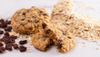 © pamela_d_mcadams - Cinnamon Raisin Oatmeal Cookies with Ingredients on a Marble Counter