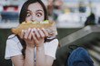 © Yakobchuk Olena - Excited surprised female looking on big hot dog