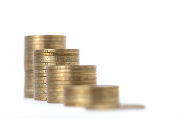 Growing coins stacks on white background. Financial growth, saving money, business finance wealth and success concept