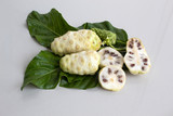 Fototapeta  - noni with leaves isolated  on white background