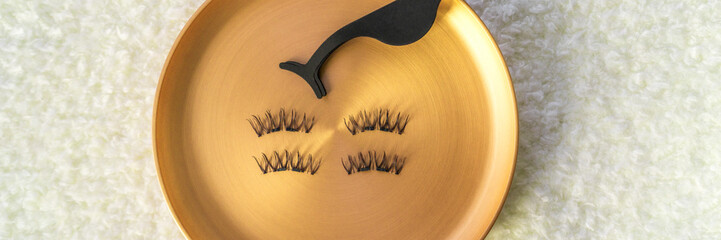 Beauty makeup banner fake eyelashes and magnetic stainless steel applicator for latest trend in false lashes.