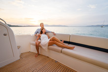Loving Couple On The Yacht.