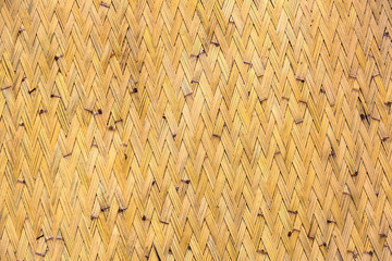 Background of wooden bamboo wall of a building in the Philippines close up