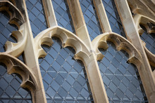 Leaded Windows With Stonework Frames To Historic Ecclesiastical Thirteenth Century Building