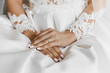 Beautiful female hands with the wedding ring and elegant manicure