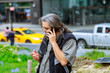 © ungvar - Man traveling in New York talking on phone summer city day