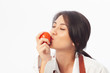 © KL 1981 - Asian young woman is happy holding and kissing fresh fruit apple with vegetables,  Healthy, Fresh food, Clean eating recipes to fuel body from the inside out concept.