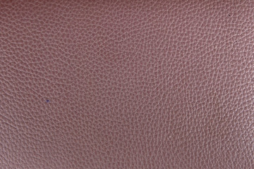 Brown leather background texture close up