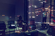 © alphaspirit - Background of business people that work during night