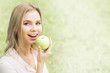 © yellowj - Woman with green apple