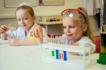 two blonde chemist school kid student little girls (girlfriend sisters) chemical experiment white me