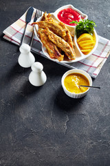 Sticker - Fried small capelins on a white plate