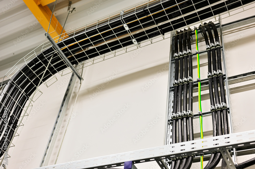 Cable Rach Steel Cables placed on the cable rack in the interior. Stock Photo | Adobe Stock