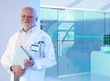 © nyul - White haired doctor professor at hospital