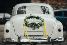 Wedding Bouquet On Vintage Wedding Car 