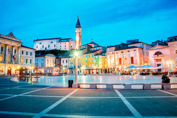 Wall Mural - beautiful amazing city scenery in the central square with the old clock tower in piran, the tourist 