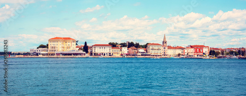 Beautiful amazing city scenery with the old tower in Porec, the tourist cente...