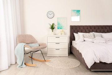 Sticker - Modern bedroom interior with comfortable chair. Stylish design