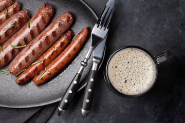 Wall Mural - Grilled sausages and beer