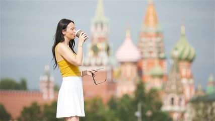 Wall Mural - Happy young urban woman in european city.