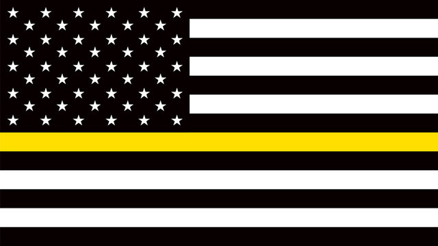 usa flag with a thin yellow or gold line - a sign to honor and respect american dispatchers, securit