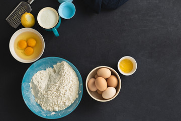 Poster - Baking ingredients cooking homemade muffins or lemon cookies. Bakery background top view