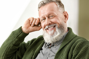 Sticker - Portrait of handsome senior man at home