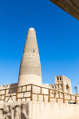 Wall Mural - Emin minaret, or Sugong tower, in Turpan, is the largest ancient Islamic tower in Xinjiang, China. Built in 1777, its grey bricks form 15 different patterns such as waves, flowers or rhombuses