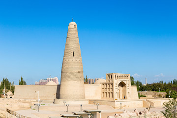 Wall Mural - Emin minaret, or Sugong tower, in Turpan, is the largest ancient Islamic tower in Xinjiang, China. Built in 1777, its grey bricks form 15 different patterns such as waves, flowers or rhombuses