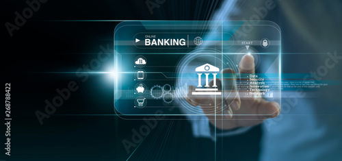 Photographie Businessman touching icon online banking and icon network connection, online pay