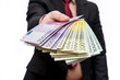 © RomanR - Male hands offering euro banknotes in fan