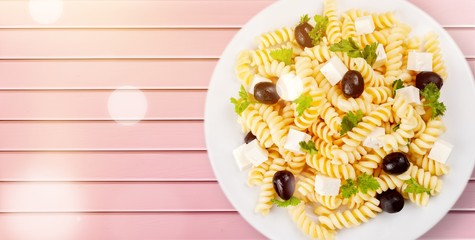 Sticker - Close-up photo of pasta with olives and cheese in white plate