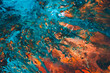 Abstract blue red paint background. Rough uneven color mix blend texture surface. Acrylic painting art design technique.