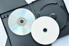 Digital Versatile Disc Or DVD With Black Plastic Box Packaging On White Background