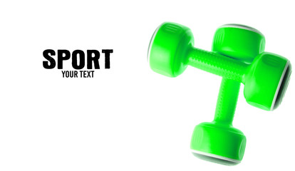 Two plastic green dumbbells isolated on a white background. Sports concept. Copy space