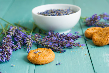 Wall Mural - cakes with lavender on aged blue wood table