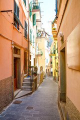 Riomaggiore, Liguria, Italy fisherman village, colorful houses on sunny warm day. Monterosso al Mare, Vernazza, Corniglia, Manarola, and Riomaggiore, Cinque Terre National Park UNESCO World Heritage